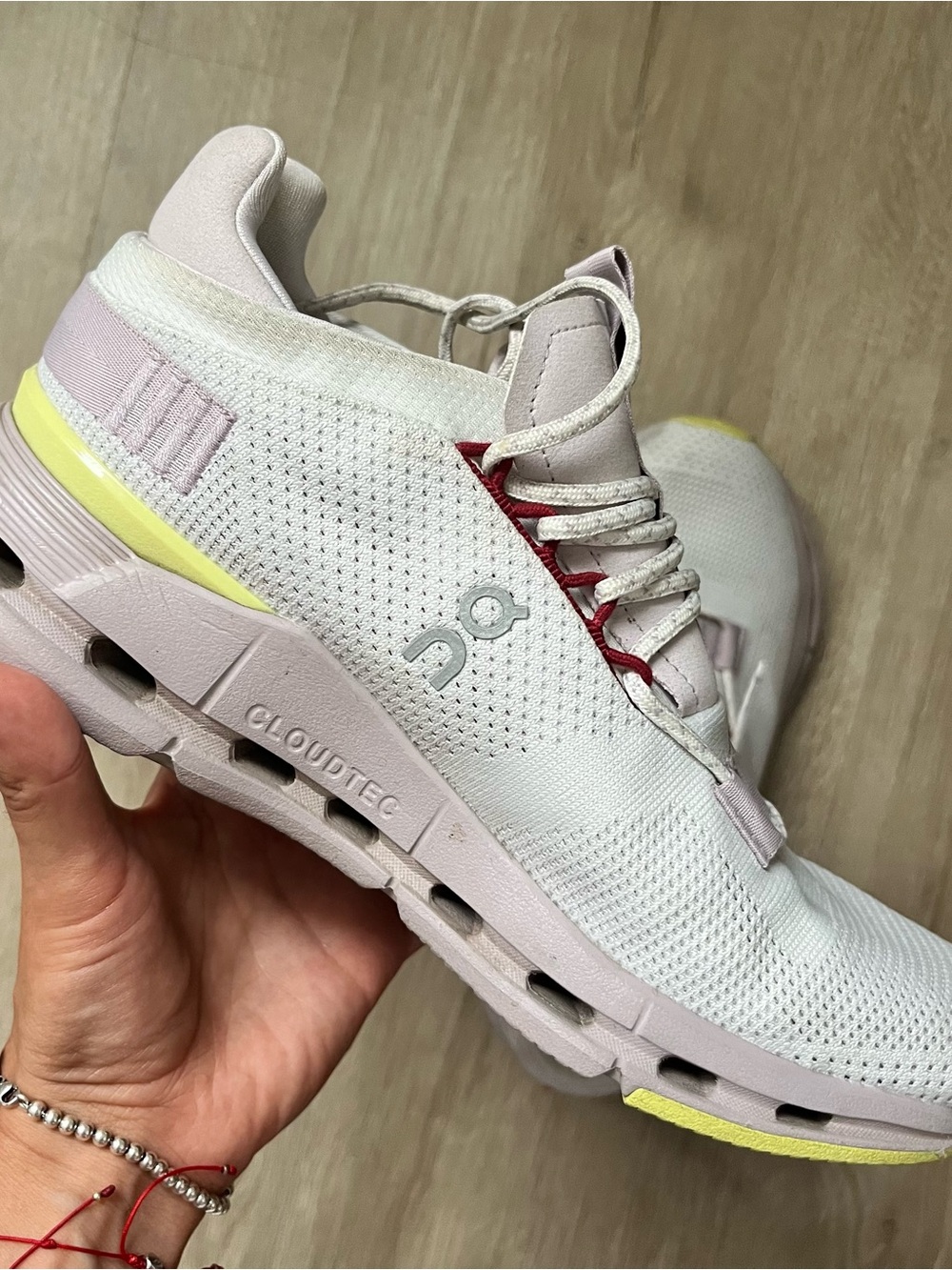 On Running Women’s White Sneakers with Pastel Pink and Yellow Accents